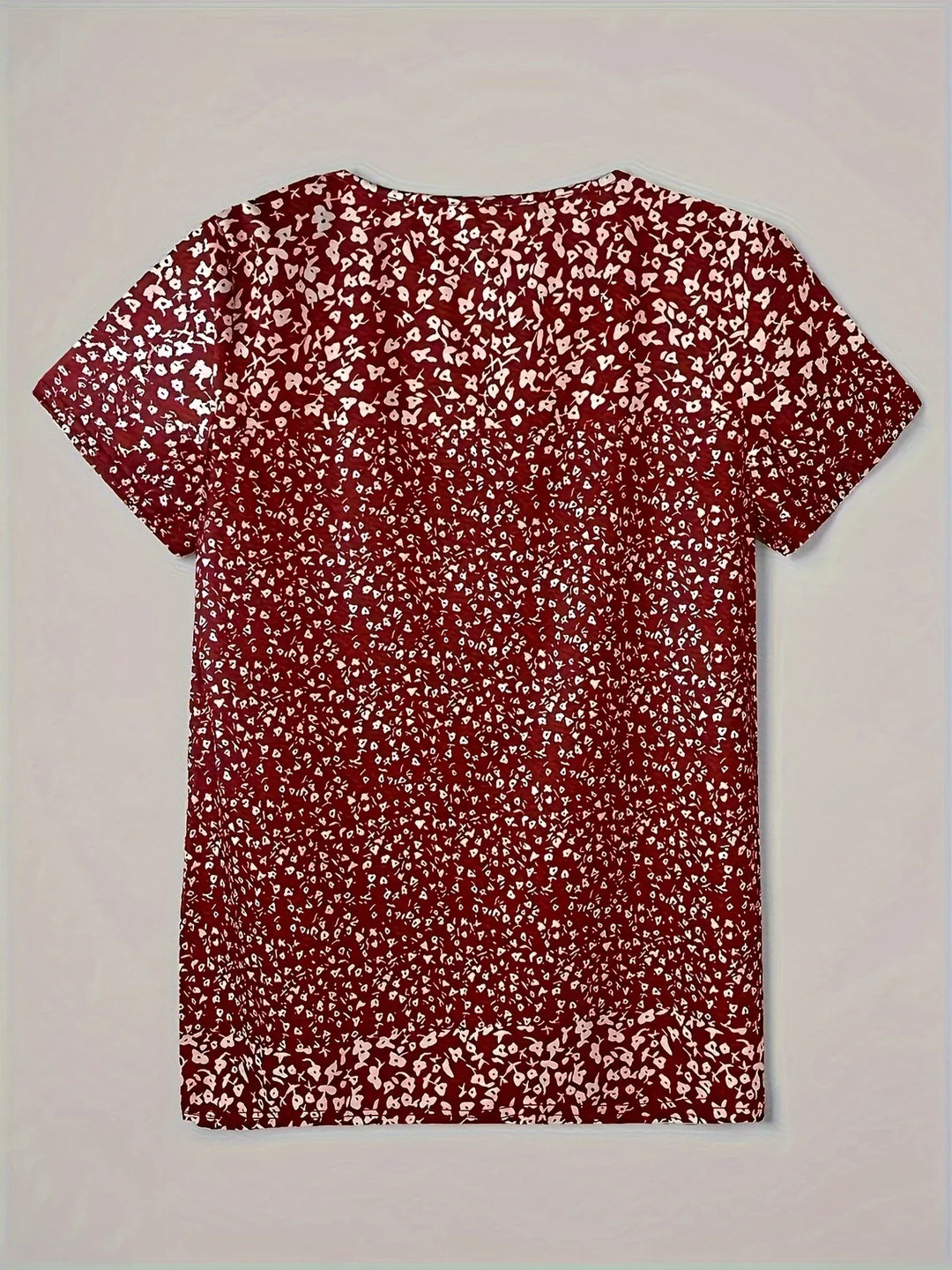 Casual Summer Top with V-Neck, Button Closure, and Short Sleeves