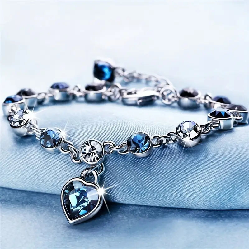 Soft shine white gold bracelet with little heart.