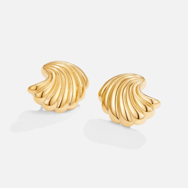 Elegant gold earrings with shell design