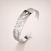Elegant hollow silver bracelet with refined finish