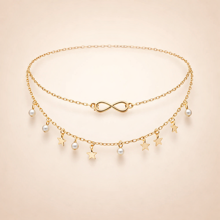 Elegant gold anklet with pearls and stars