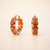 Elegant gold earrings with refined crown shape