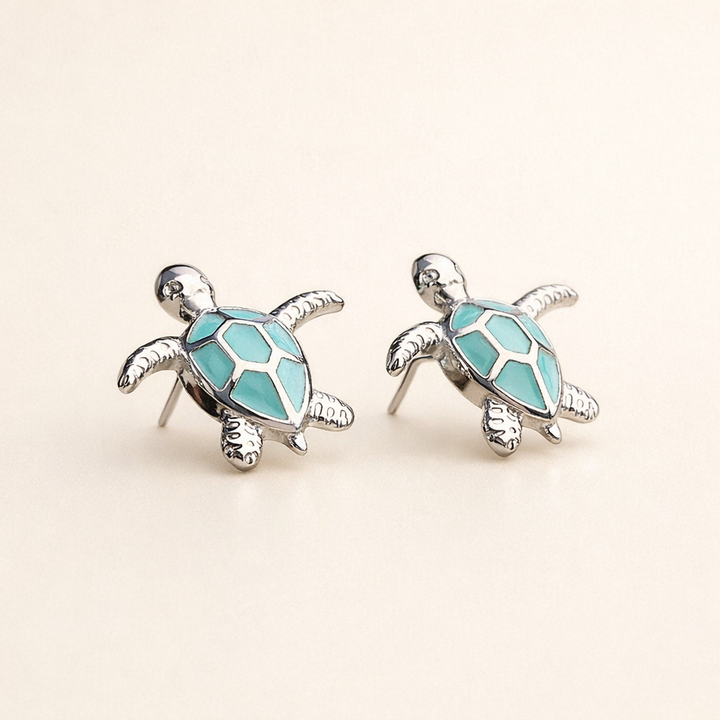 Silver earrings with opal in sea turtle design