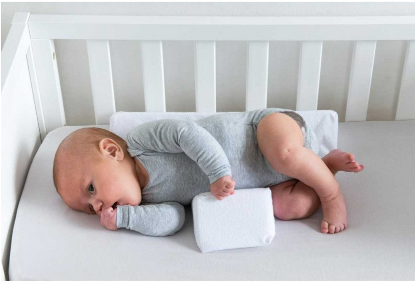 Cudlo Adjustable Anti-Roll Pillow for Babies