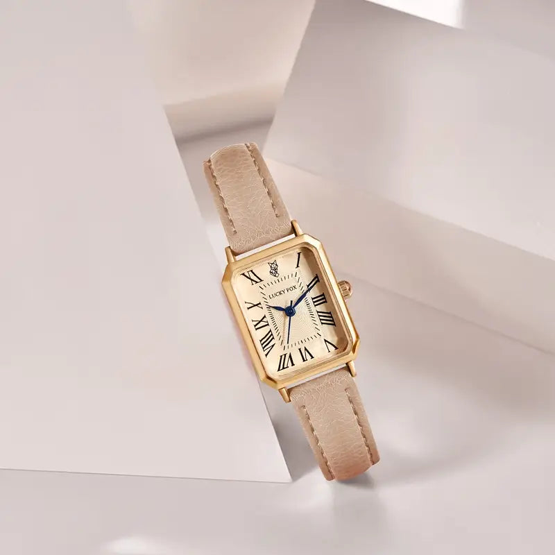 Elegant gold watch with a refined little stone