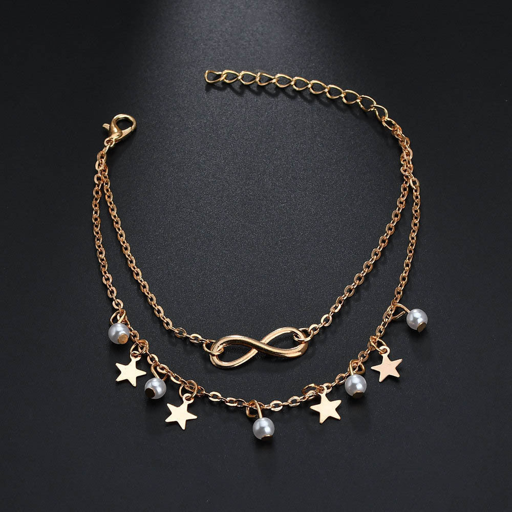 Endless pearl and stars anklet in silver
