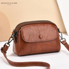 Cross-body bag with multiple pockets and adjustable strap