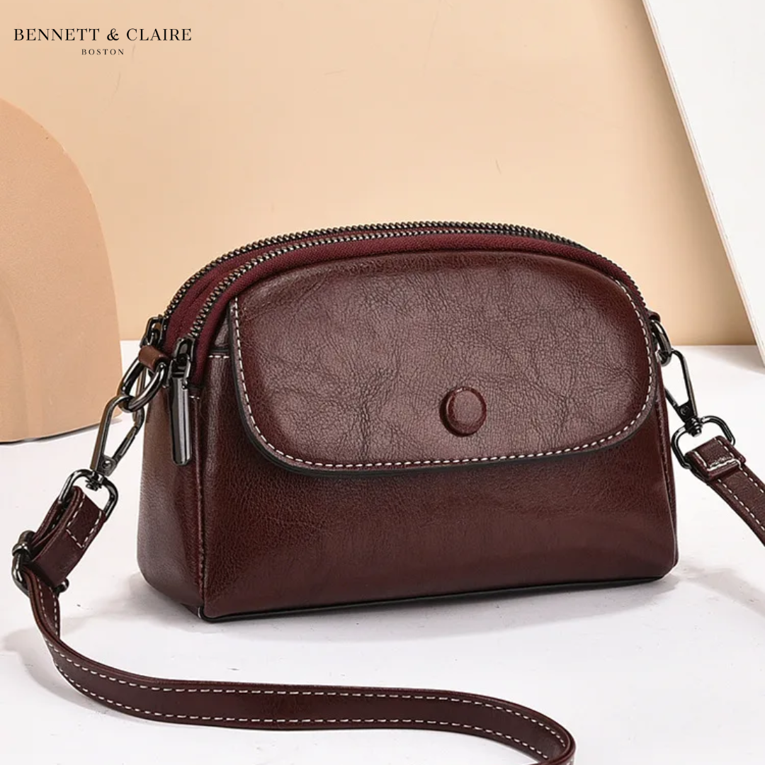 Cross-body bag with multiple pockets and adjustable strap