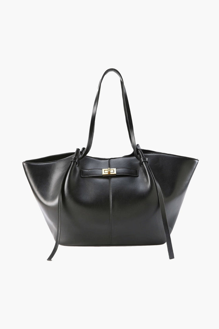 Everyday leather tote with a clasp detail on the front.