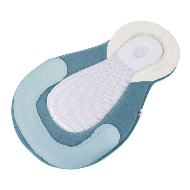 Ergonomic Portable Baby Lounger with Flat Head Prevention Headrest – Schlafcocon