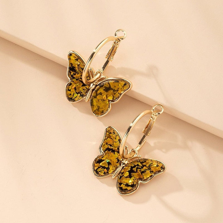 Butterfly earrings with colorful details.