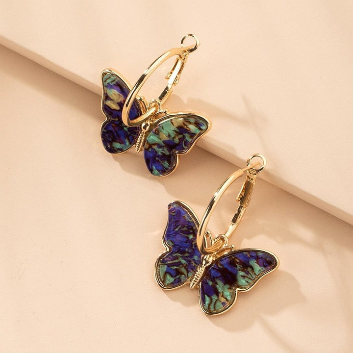Butterfly earrings with colorful details.