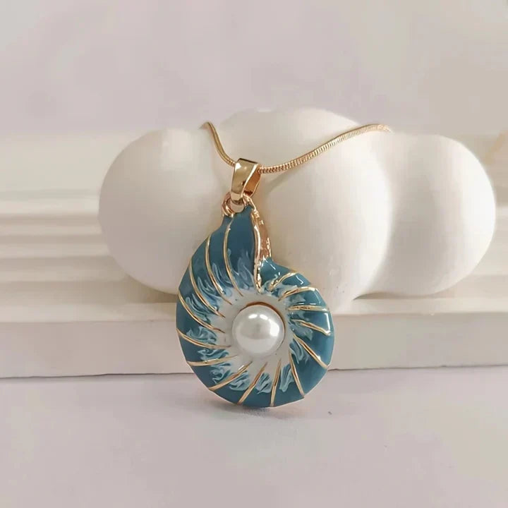 Soft blue pearl necklace with shell elements