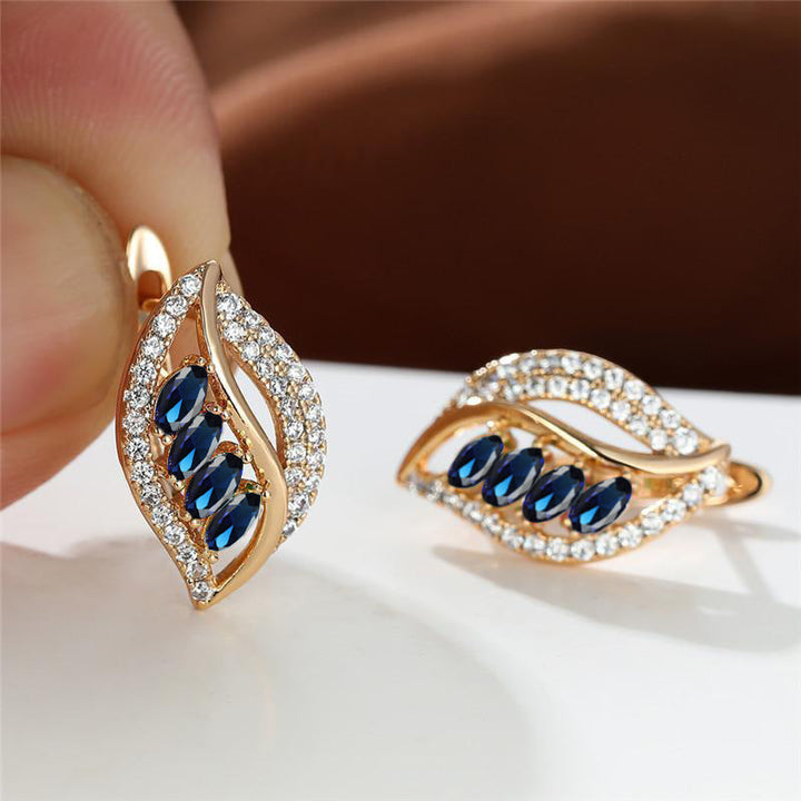 Ethereal gold earrings with delicate cubic zirconia
