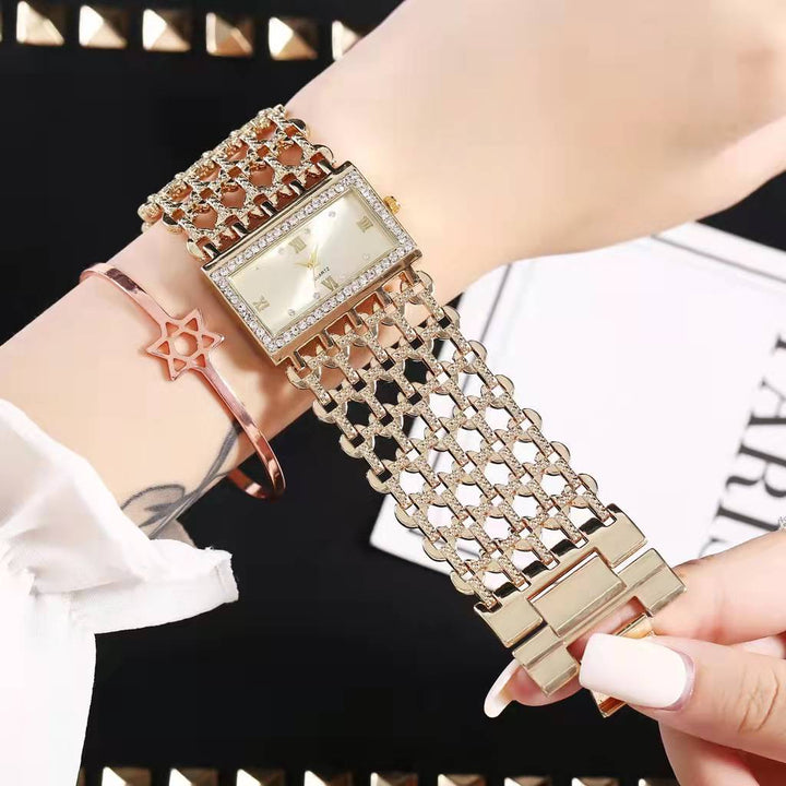 Minimalist rose gold watch with subtle link chain