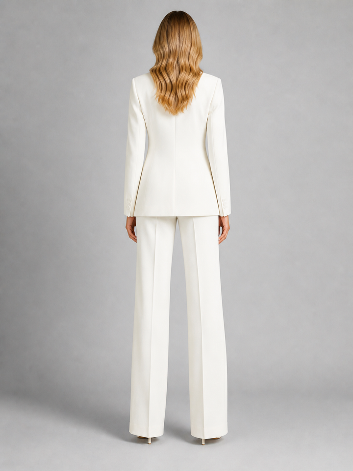 Two-piece women's set: women's blazer with tailored cut and wide-leg pants