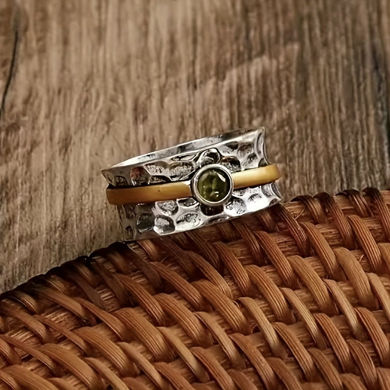 Refined ring with green cubic zirconia