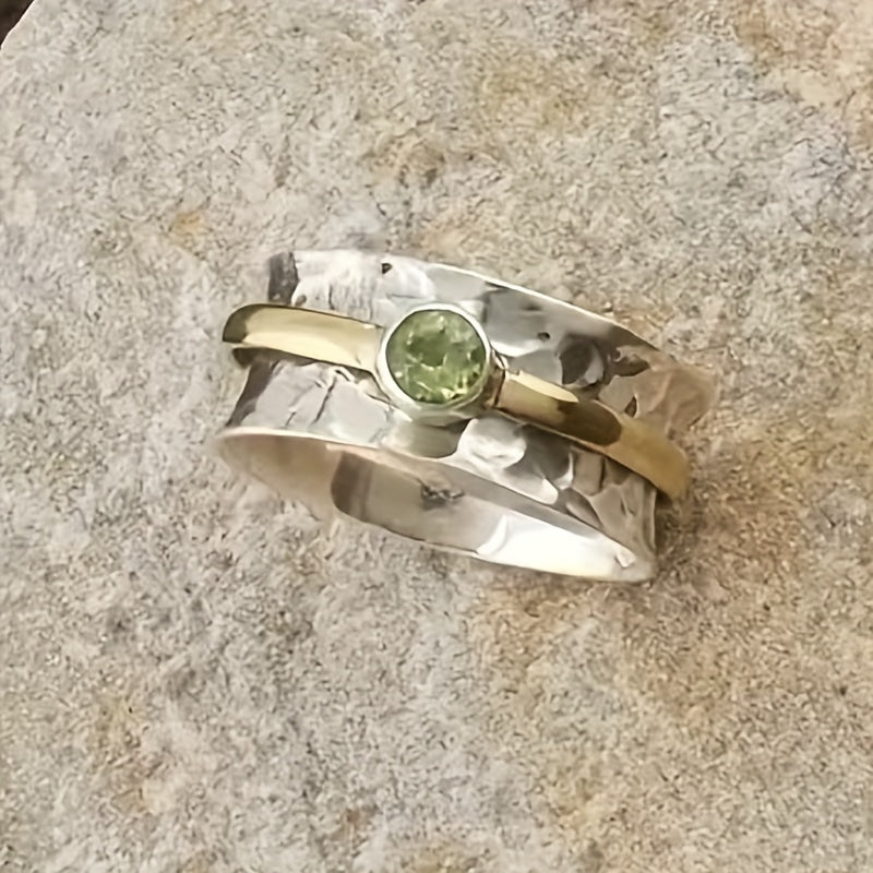 Refined ring with green cubic zirconia