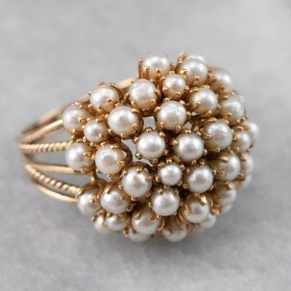 Elegant Ring with Inlaid Pearls