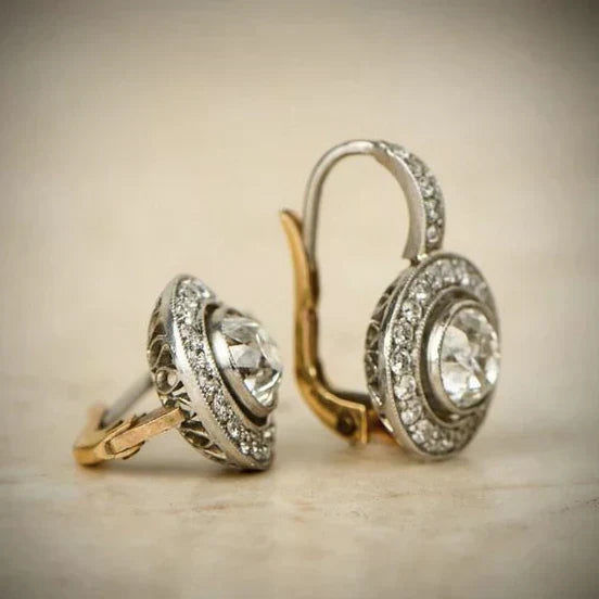 Elegant silver earrings with cubic zirconia and gold accents