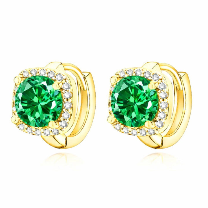 Elegant gold earrings with emerald detail