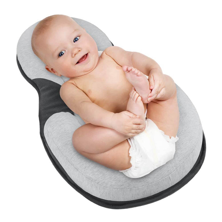 Ergonomic Portable Baby Lounger with Flat Head Prevention Headrest – Schlafcocon