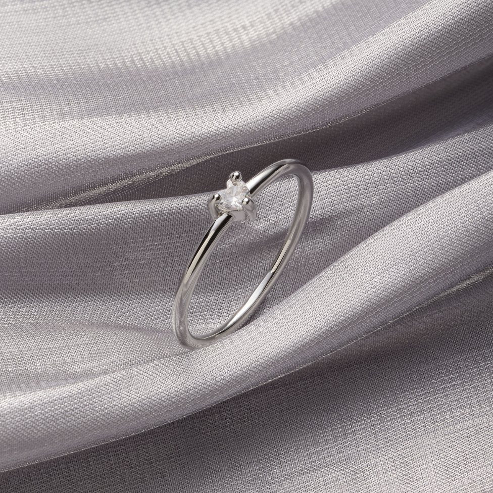 Delicate cubic zirconia ring with little heart