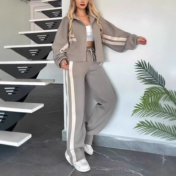 Women's leisure set with zip-up jacket and wide-leg pants with contrast stripes