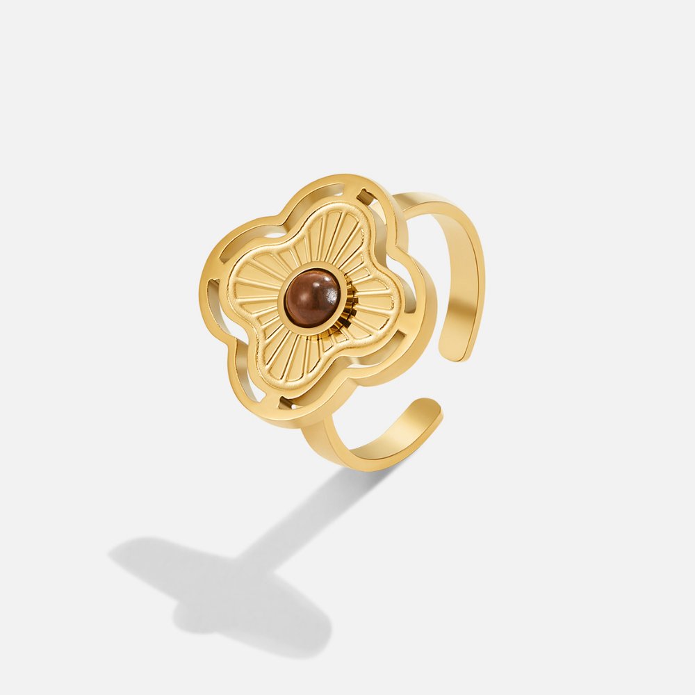 Silver ring with tiger's eye and delicate flower motifs