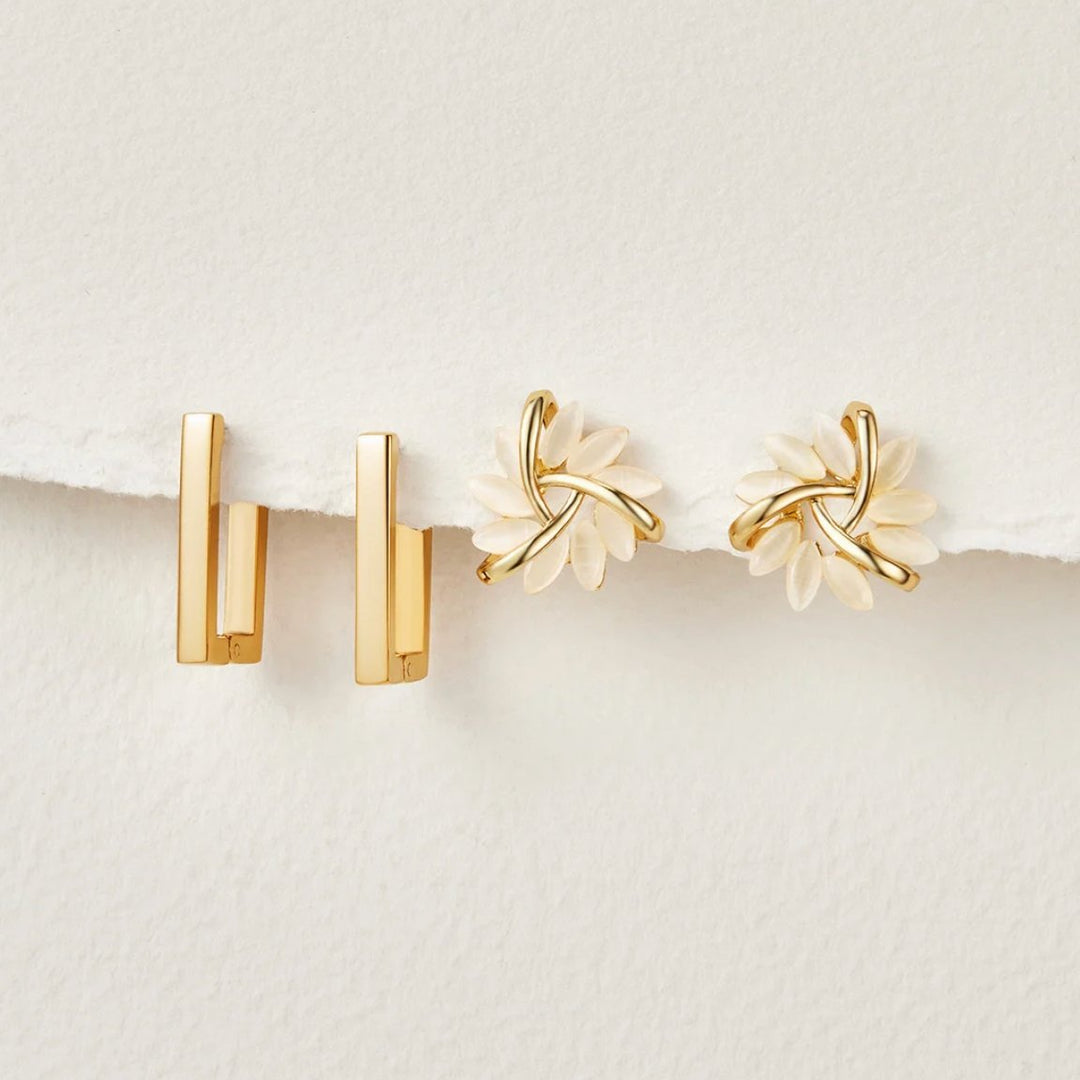 Elegant gold earrings with flower motif
